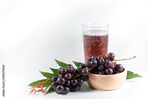 glass of pomegranate juice and cherries isolated on white background