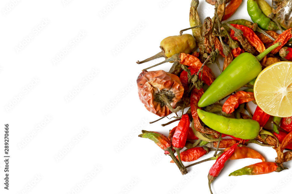 red and green dried chilies with fresh chilies isolated on white background red and green dried chilies with fresh chilies isolated on white background