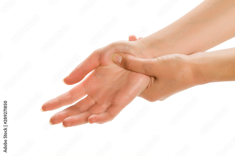 Woman massaging her hand, close up, isolated on white. Woman massaging her hand, close up, isolated on white.