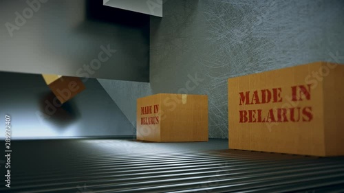 Made in belarus. Shipping and Moving Boxes with stamp belarus move on roller conveyor photo