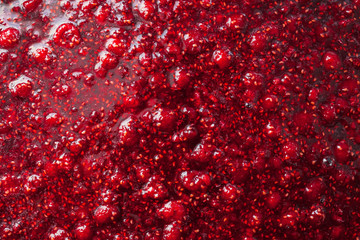 Papier peint photo Restaurant Confiture de framboises texture macro  © zadveri