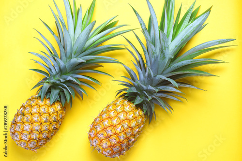 pineapple with yellow background. summer fruit concept. 