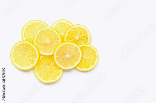 Fresh lemon slices on white. Copy space