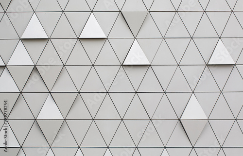 Fototapeta Naklejka Na Ścianę i Meble -  Silver geometric wall background with triangles.