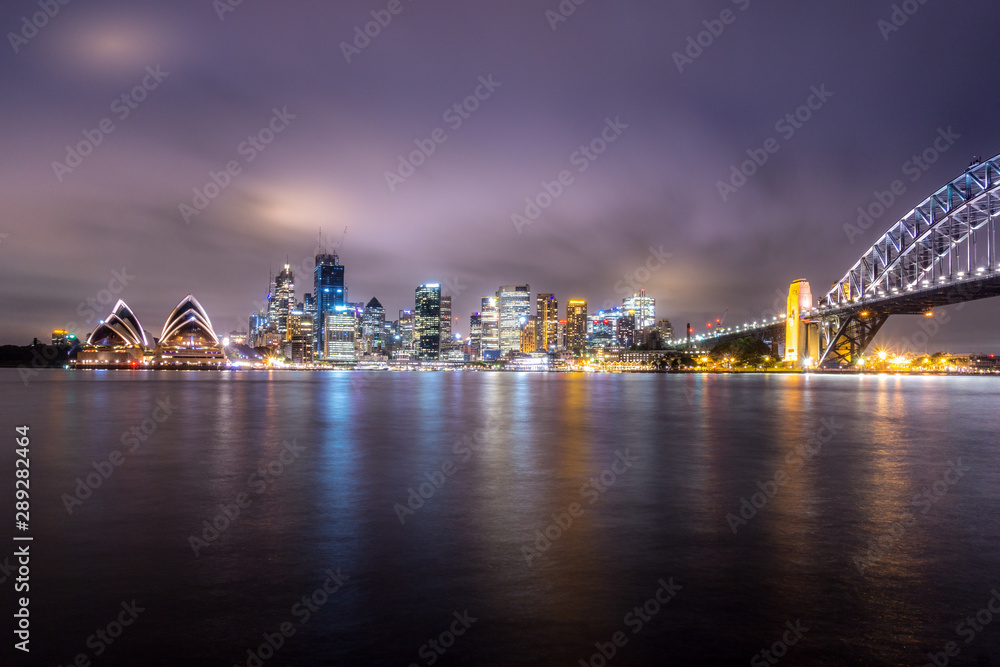 Sydney Harbour and Skyline at night. Panorama from Kirribilli, North Sydney.