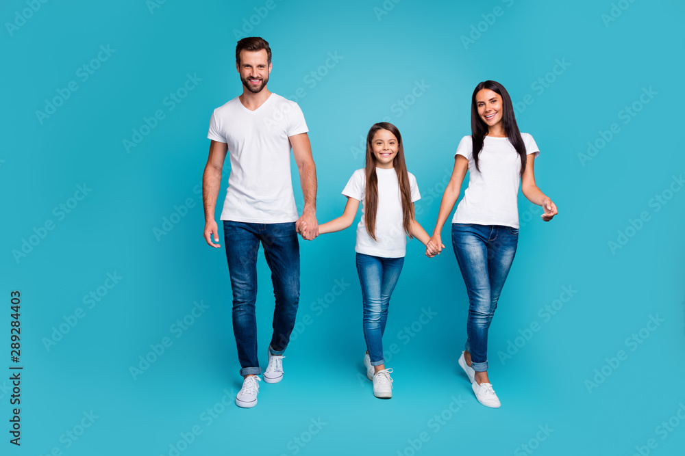 Fototapeta premium Full body photo of daddy mommy and small lady walking down street to zoo wear casual outfit isolated blue background