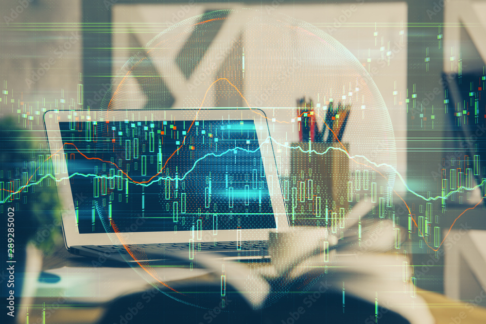 Double exposure of graph and financial info and work space with computer background. Concept of international online trading. Double exposure of graph and financial info and work space with computer background. Concept of international online trading.