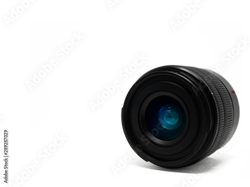 A mirrorless camera lens on white background