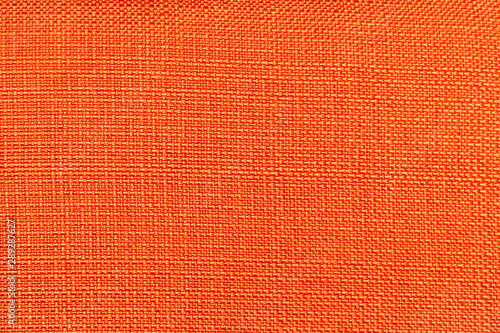 Rough bright orange fabric texture for background and design © pro2audio
