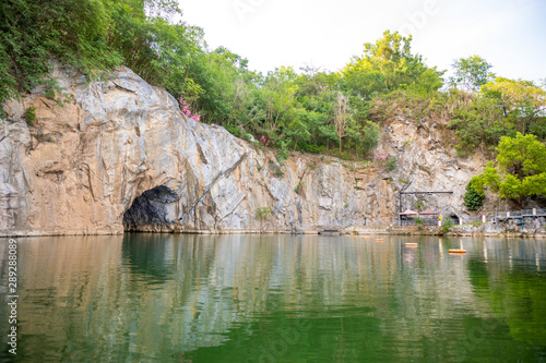 Lake and roks in Danzhou Stone Flower Caves, Geopark next to Haikou, Hainan, China