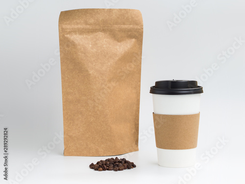 Big paper coffee cup and Craft paper bag for coffee beans with copy space for branding logo. Mockup for takeaway coffee
