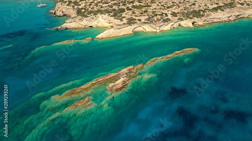 Aerial drone photo of Laki paradise beach with beautiful emerald and turquoise sea and small volcanic bays, Kato Koufonisi, Small Cyclades, Greece