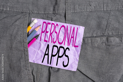 Conceptual hand writing showing Personal Apps. Concept meaning Organizer Online Calendar Private Information Data Writing equipment and purple note paper inside pocket of trousers