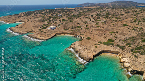 Aerial drone photo of turquoise paradise beaches of Kato Koufonisi island main Chora and church of Panagia, Small Cyclades, Greece