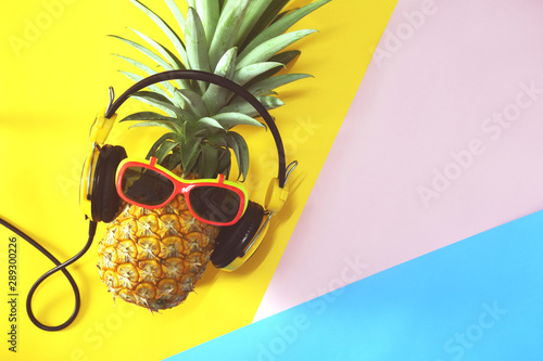 pineapple with glasses. summer fruit concept. 