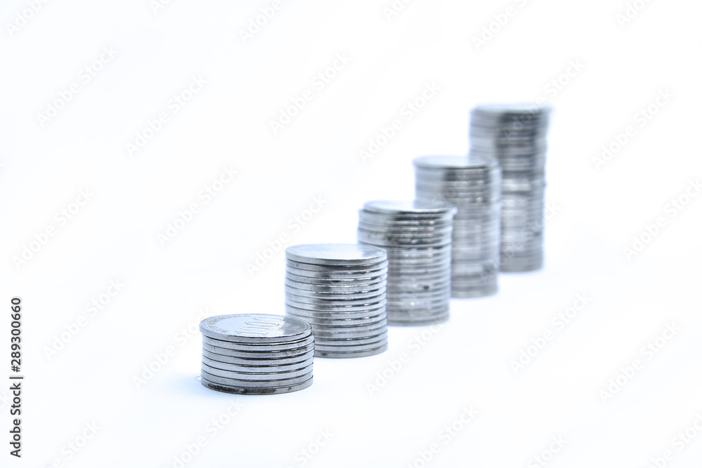 pile of silver coins stack and growing money graph on rows, isolated on white background with clip path. Income, profits, finance, Investment, Interest and Saving money concept, indonesia rupiah., pile of silver coins stack and growing money graph on rows, isolated on white background with clip path. Income, profits, finance, Investment, Interest and Saving money concept, indonesia rupiah.,