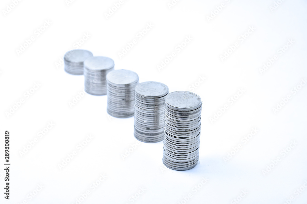 pile of silver coins stack and growing money graph on rows, isolated on white background with clip path. Income, profits, finance, Investment, Interest and Saving money concept, indonesia rupiah., pile of silver coins stack and growing money graph on rows, isolated on white background with clip path. Income, profits, finance, Investment, Interest and Saving money concept, indonesia rupiah.,