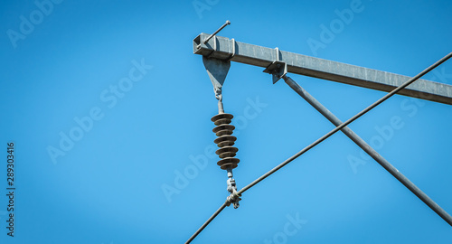 catenary on a background of blue sky photo