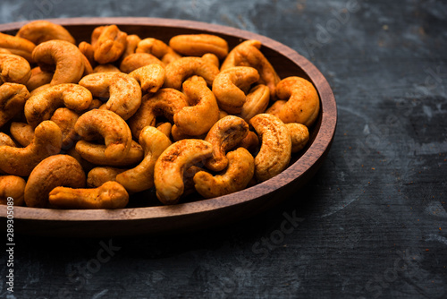 Masala Kaju or spicy Cashew in a bowl. Popular festival snack from India/asia, also known as Chakna recipe