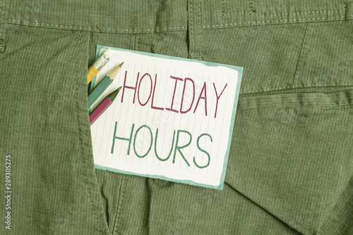 Handwriting text Holiday Hours. Conceptual photo Schedule 24 or7 Half Day Today Last Minute Late Closing Writing equipment and white note paper inside pocket of man work trousers