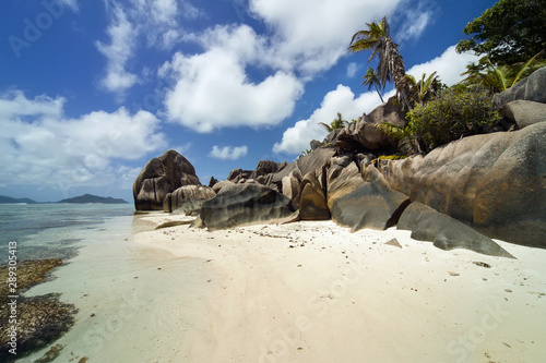 The famous beautifully shaped granite boulders at the coast La Digue island, Seychelles