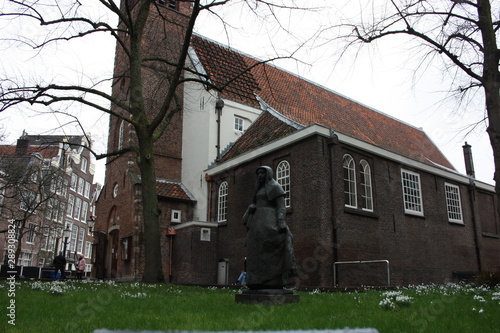 The quarter of the Beguines of Amstedam. Beguinage in the secret garden of the Beguines in Amsterdam on a winter day photo