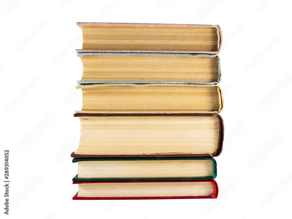 A stack of books of different colors with aged yellow pages A stack of books of different colors with aged yellow pages