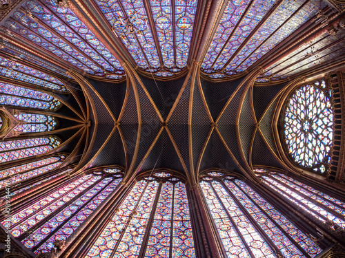 PARIS - May 2018: The Sainte Chapelle in Paris, France. This 1246 inspired monument features 15 wonderful stain-glass windows in Paris.