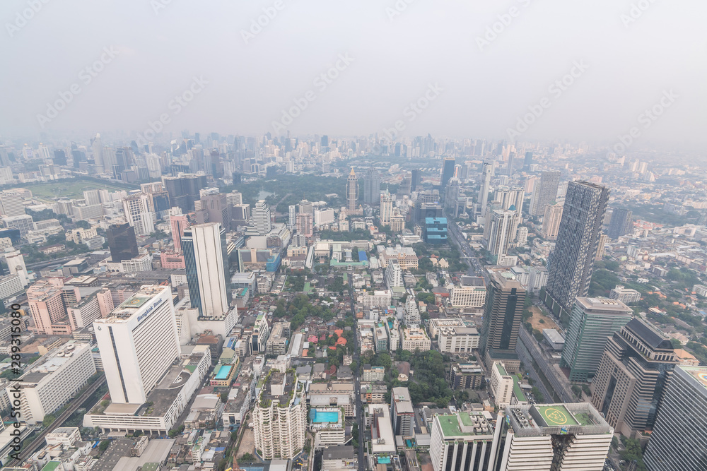 Air pollution in Bangkok with PM2.5 air-quality index (AQI) reached dangerous level with dust and smog in hazy sky, threatening to public health, rooftop view