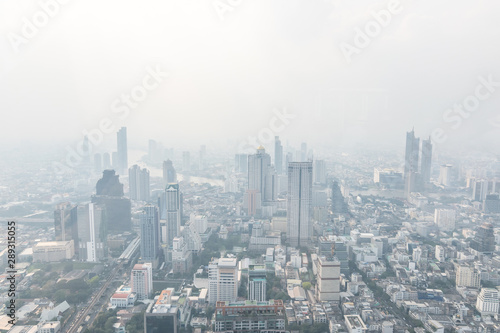 Air pollution in Bangkok with PM2.5 air-quality index (AQI) reached dangerous level with dust and smog in hazy sky, threatening to public health, rooftop view