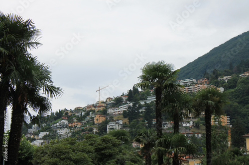 view of the city center on a cloudy summer day Locarno  Switzerland © Inna