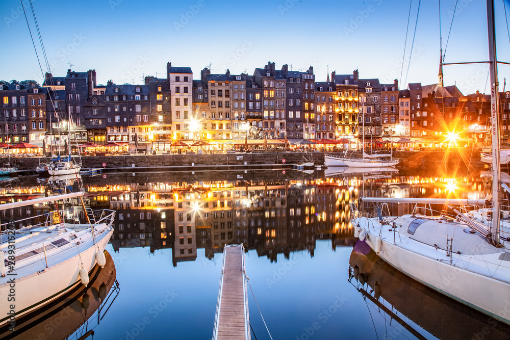HONFLEUR, FRANCE - MAY4, 2018:Waterfront reflection of traditional houses in Honfleur, Normandy, France