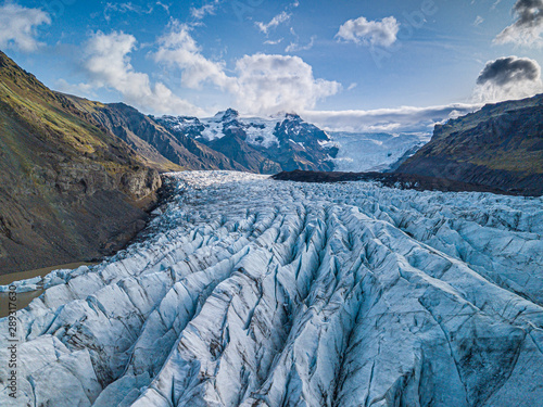 Svnafellsjkull Glacier in Iceland. Top view. Skaftafell National Park. Ice and ashes of the volcano texture landscape, beautiful nature ice background from Iceland photo