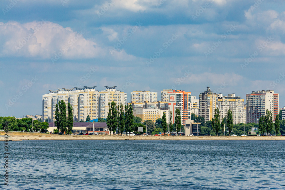 Voronezh, Russia, June 17, 2019. View from Admiralteyskaya Embankment to new microdistrict located on opposite bank of Voronezh River. Modern urban landscape on opposite bank of river.