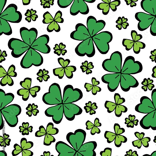 Clover leaf hand drawn doodle seamless pattern vector illustration on white background. St Patrick's Day symbol, Irish lucky shamrock background.