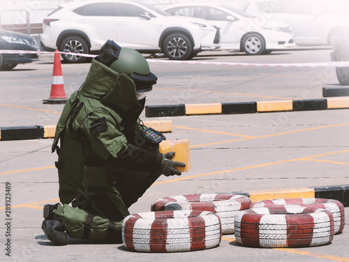 Bomb Disposal Expert in Bomb suit for Explosive ordnance disposal