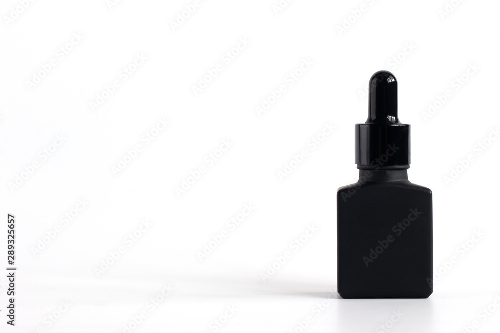 Mockup product of black serum bottle on white background with copy space Mockup product of black serum bottle on white background with copy space