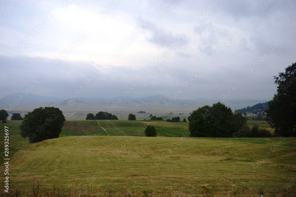 landscape of mountain meadows in the morning