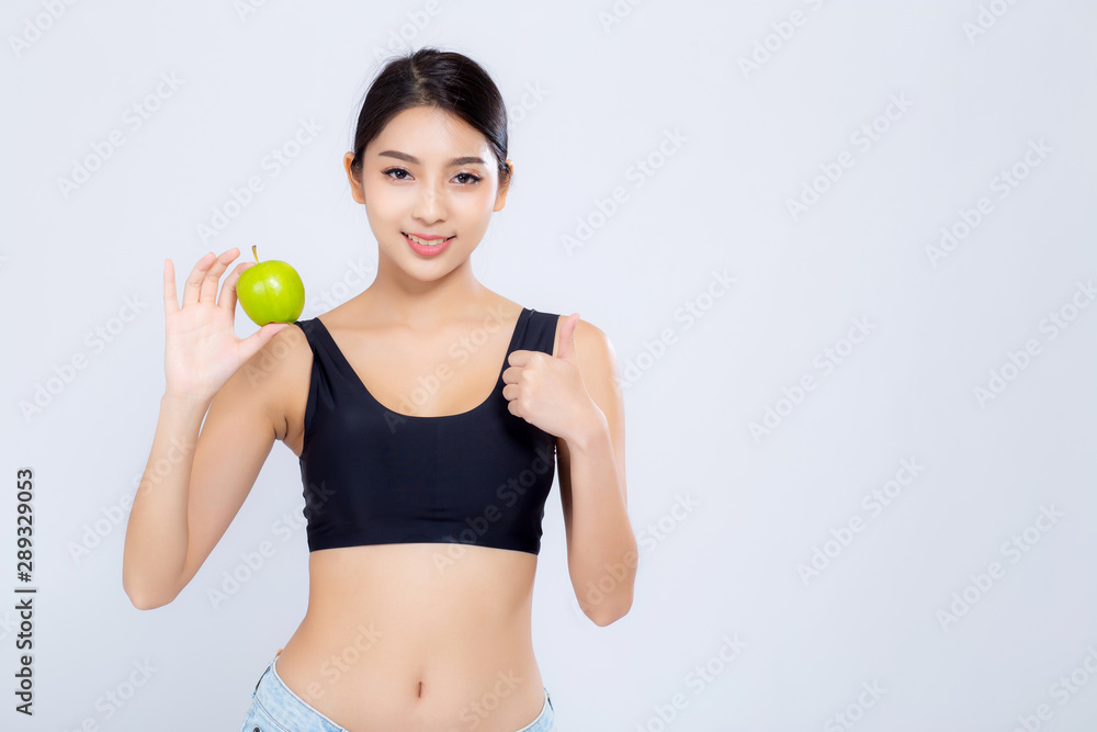 Portrait asian woman smiling holding green apple fruit and beautiful body diet with fit isolated on white background, girl weight slim with cellulite or calories, health and wellness concept. Portrait asian woman smiling holding green apple fruit and beautiful body diet with fit isolated on white background, girl weight slim with cellulite or calories, health and wellness concept.