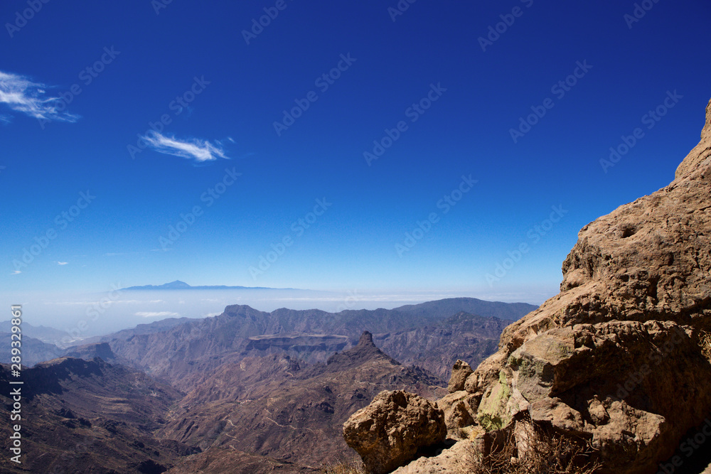 Panorama of Gran Canaria island with the Teide de Tenerife in the distant background.