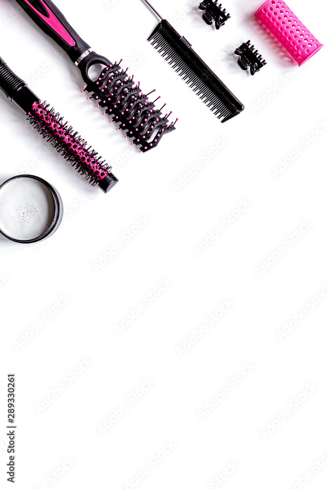 Tools for hair styling on white background top view Tools for hair styling on white background top view