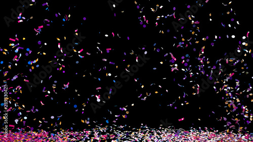 A fountain of colorful confetti falling on the floor on an black background