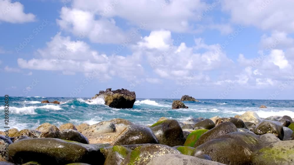 Waves hitting the northern coast of Madeira island at Ilhéu da Rocha do Navio in the middle of the Atlantic Ocean. Waves hitting the northern coast of Madeira island at Ilhéu da Rocha do Navio in the middle of the Atlantic Ocean.