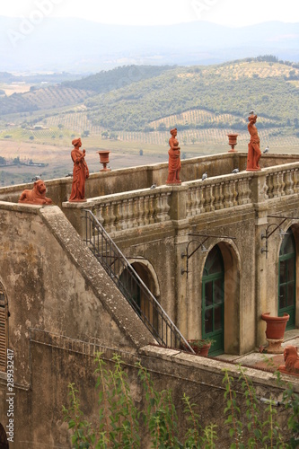 Garden with terrace and porch in Massa Marittima. In the backgro