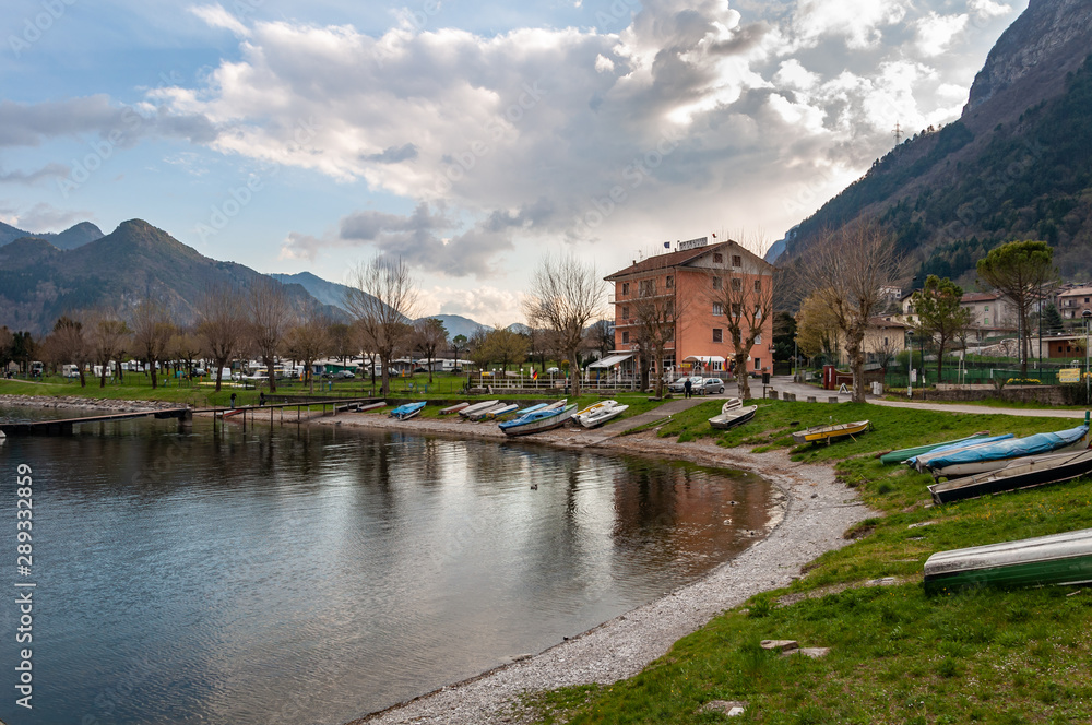 Anfo on Lake Idro, a beautiful town with a tourist and fishing port, a tourist destination for holidays by the lake, at the foot of the Alps immersed in unspoilt nature.