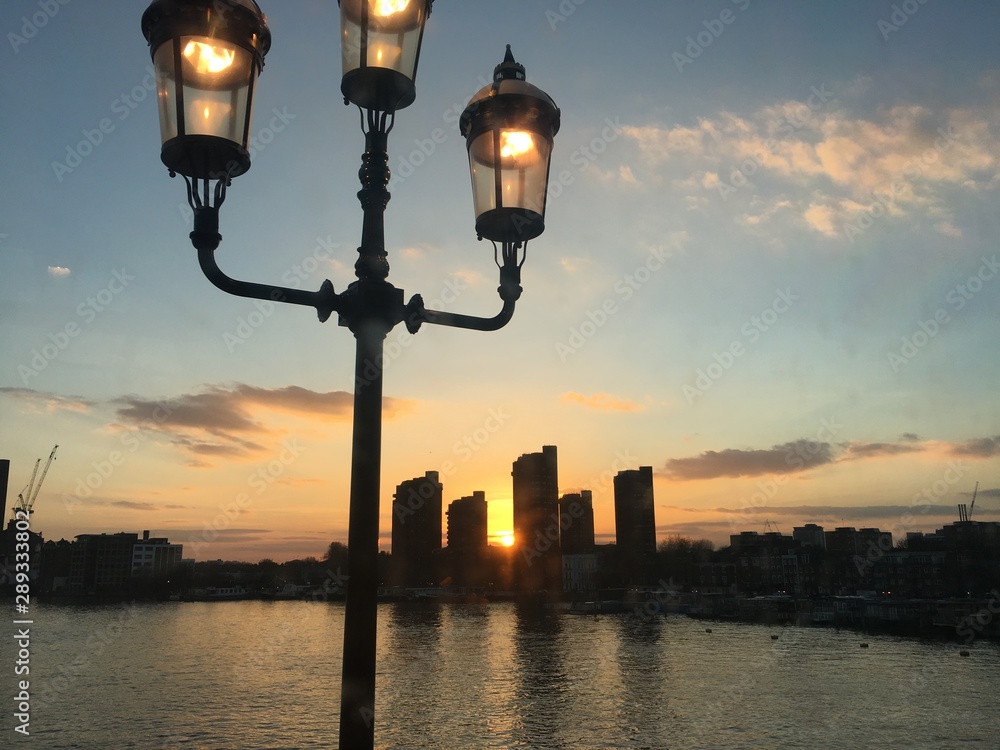 old street lamp at sunset