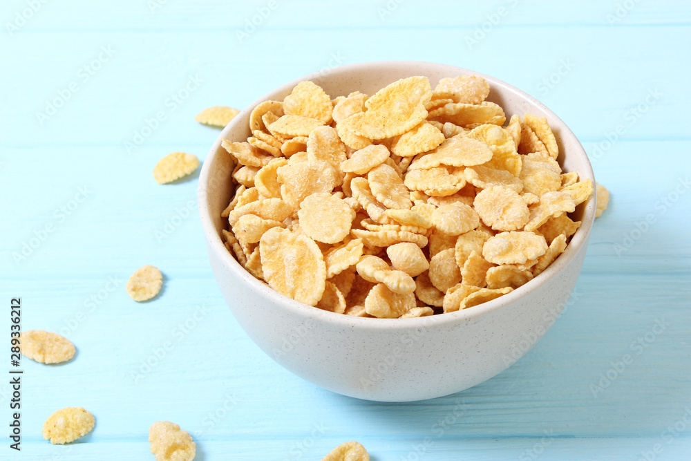 dry breakfast in a plate on a colored background top view. cereal dry breakfast in a plate on a colored background top view. cereal