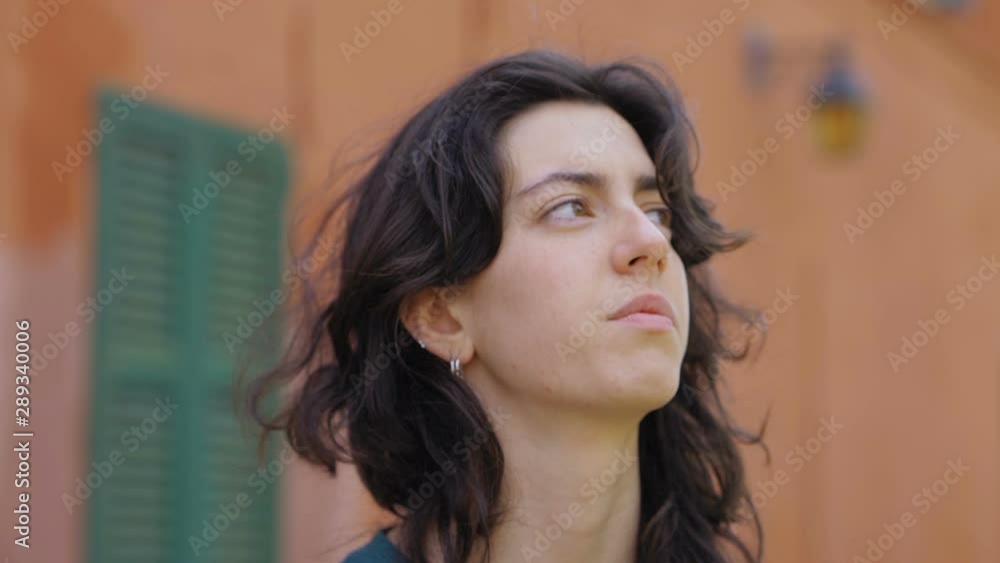 Pensive beautiful young woman in contemplation.Thoughts,problems-outdoor Pensive beautiful young woman in contemplation.Thoughts,problems-outdoor