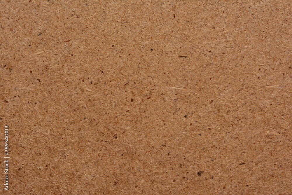 Kraft paper brown cardboard. Close up Kraft paper brown cardboard. Close up