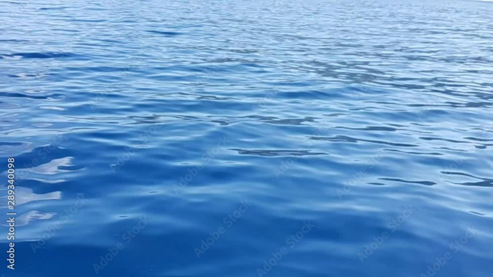 Deep blue sea water motion flow, fluid splash slow motion Deep blue sea water motion flow, fluid splash slow motion